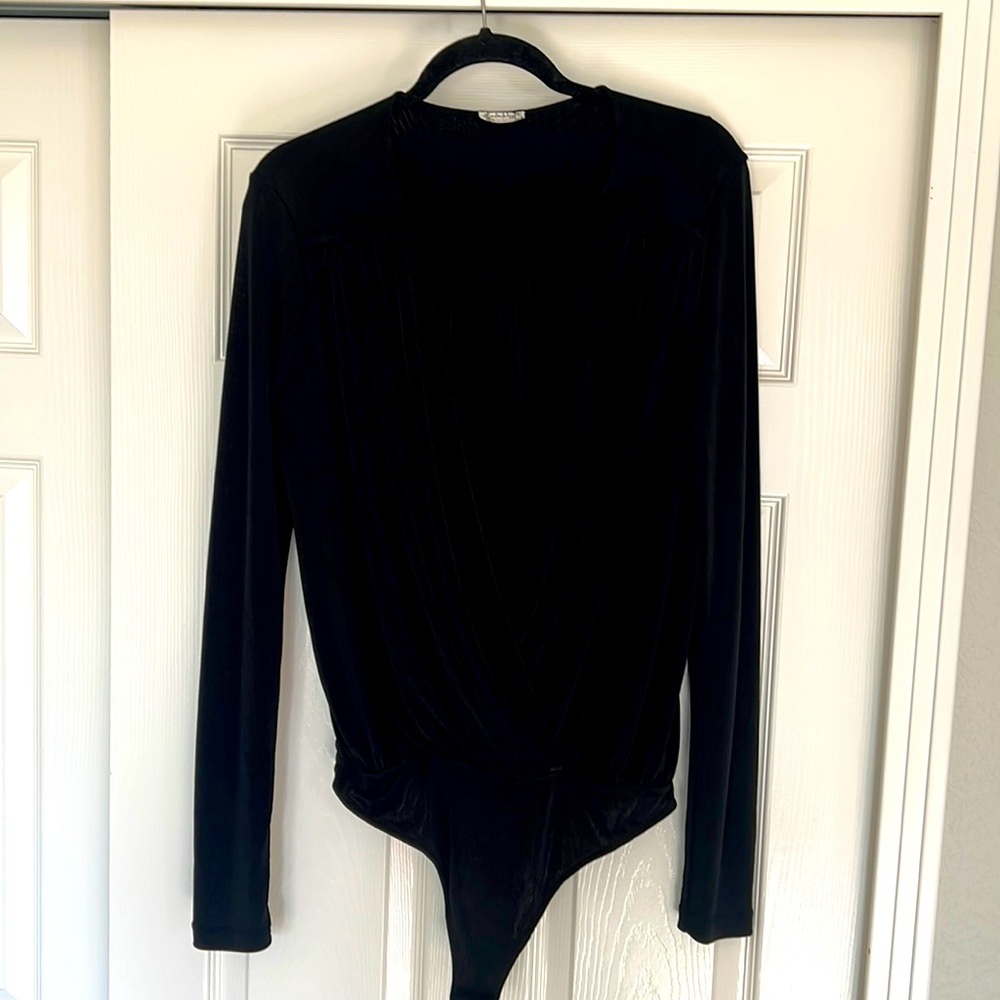 NWOT intimately free people bodysuit. Size large.